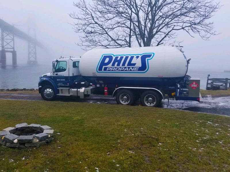 Phil's Propane truck delivering in all weather conditions