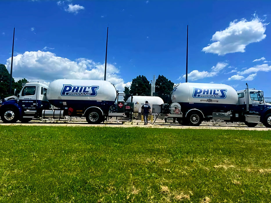 Phil's Propane fuel trucks making a delivery